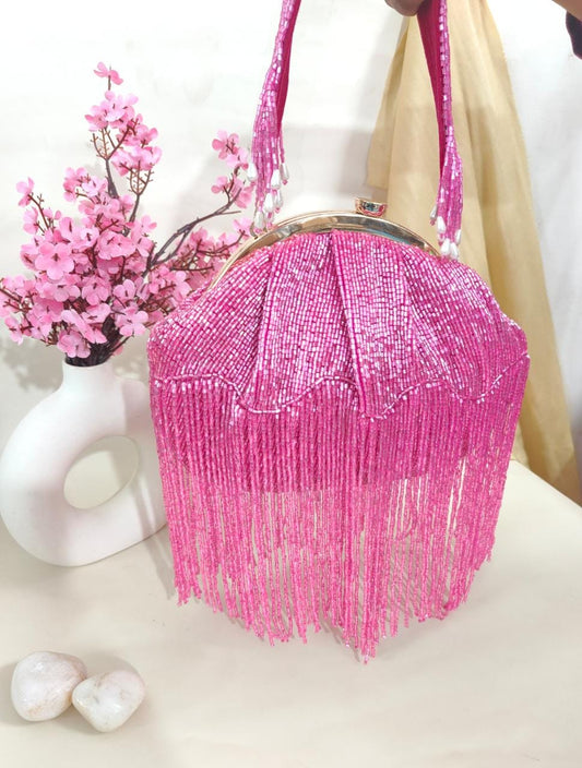 Rihana inspired tasssel clutches