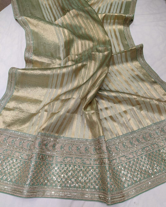 Nashel jari organza saree