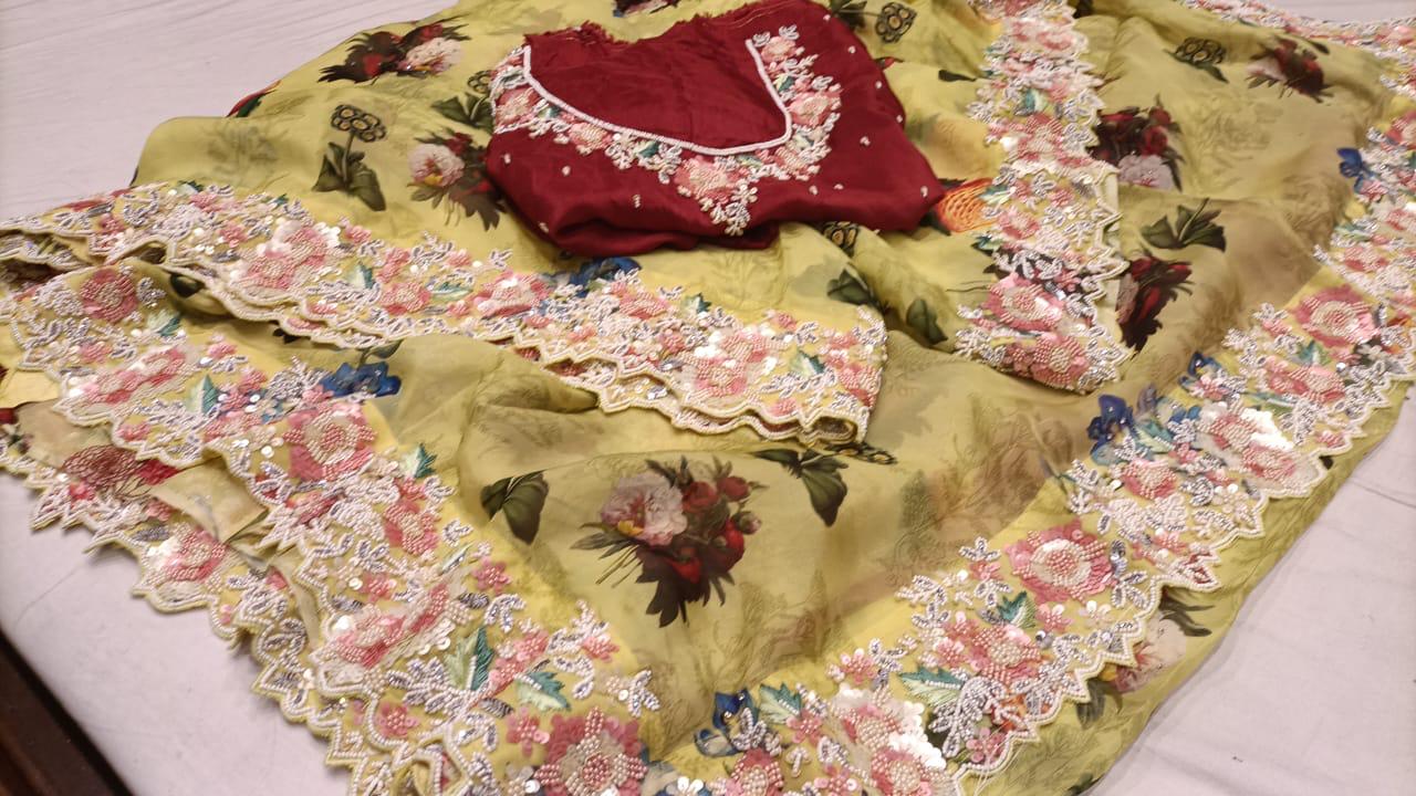 Vumia partywear organza embroidery saree