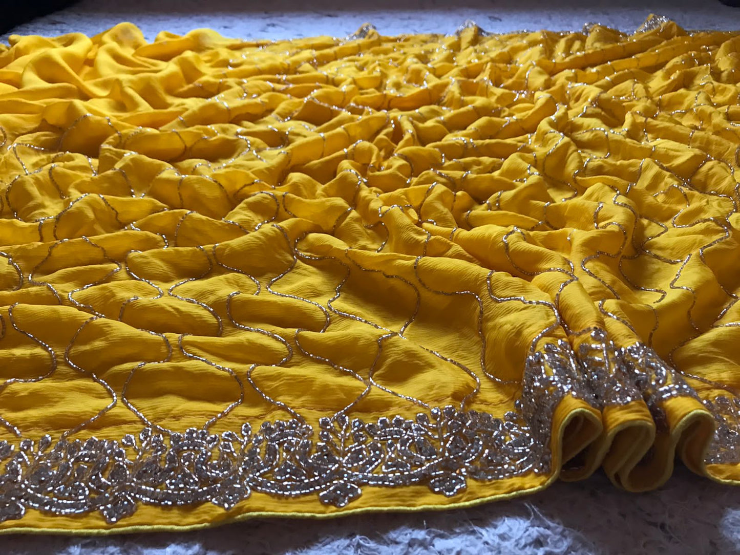 Yellow chiffon crepe feather sarees