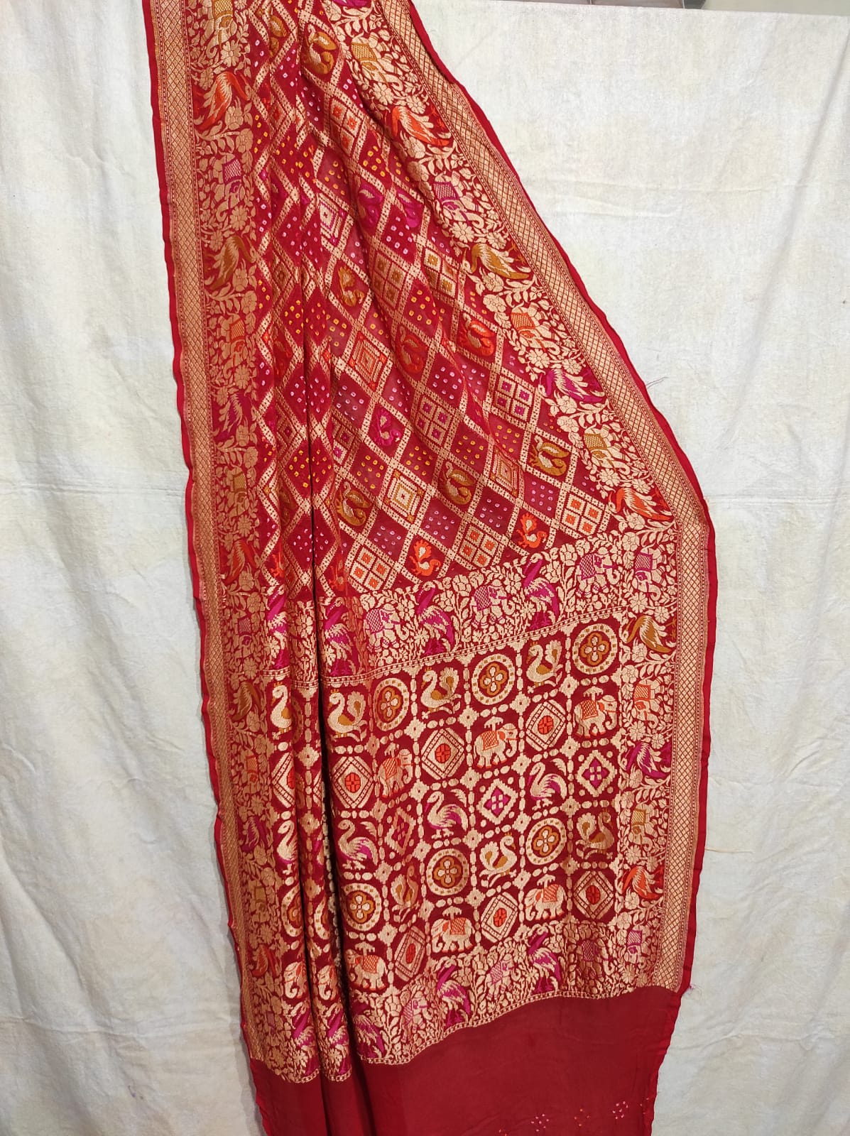 Gulmarg red bandhej saree