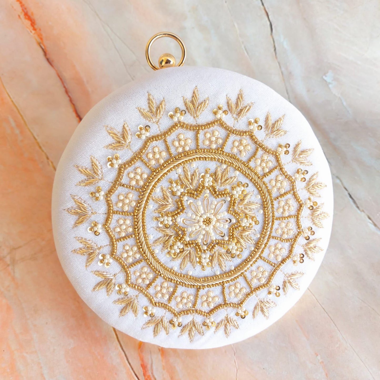 Round embroidery clutch